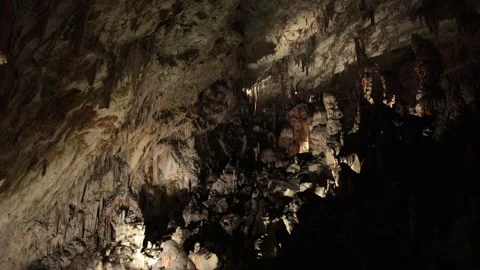 A shot of a cave inside a mine, featuring bright stalagmites and stalactites Video stock 304591608