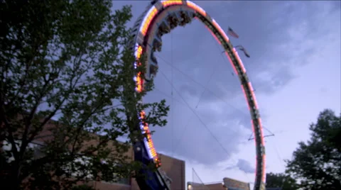 Shot of circular rollercoaster swaying back and forth. Stock Footage 52453551