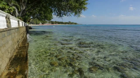 Shot of clear ocean water surrounded by rocks Stock Footage 37163232