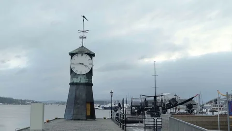 Shot of the clock at Aker Brygge in Oslo in the winter, Norway, wide Stock Footage 75015609