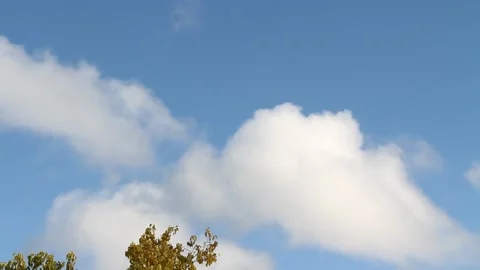 Shot of clouds in blue sky Stock Footage 247561596