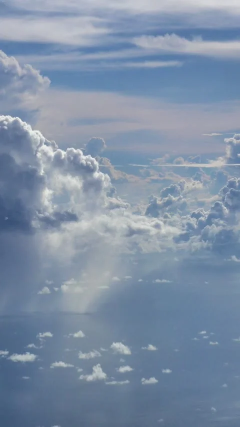 Shot of clouds with different colors and sunlight going through Video stock 228827766