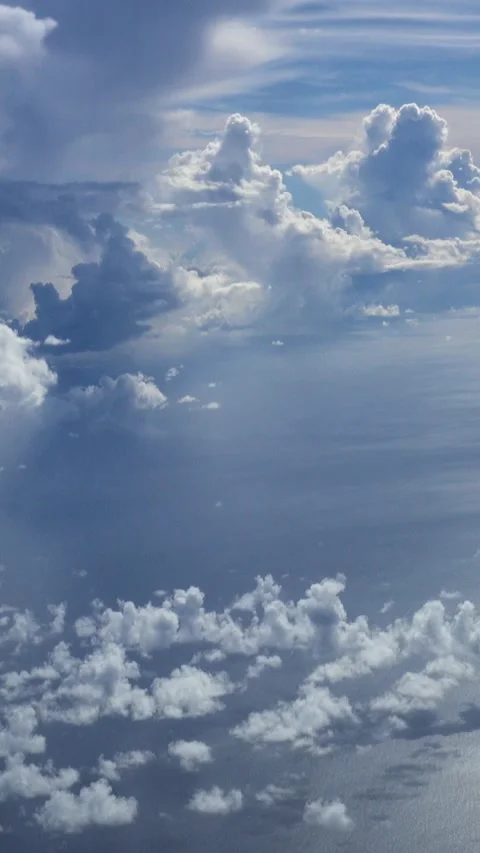 Shot of clouds with different colors and sunlight going through Stock Footage 228827780