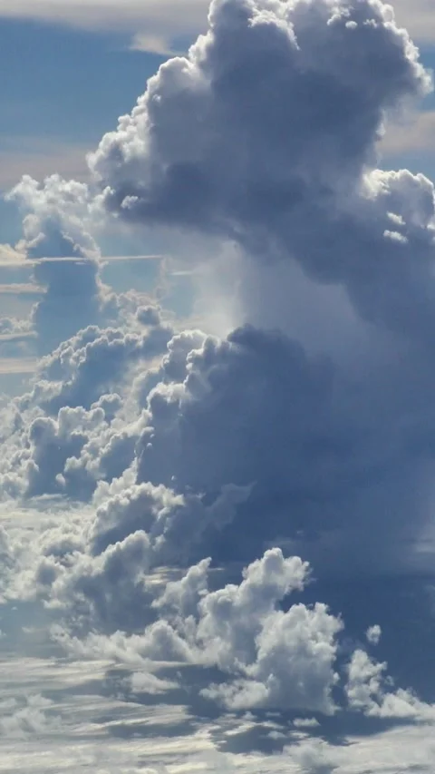 Shot of clouds with different colors and sunlight going through Stock Footage 228827782