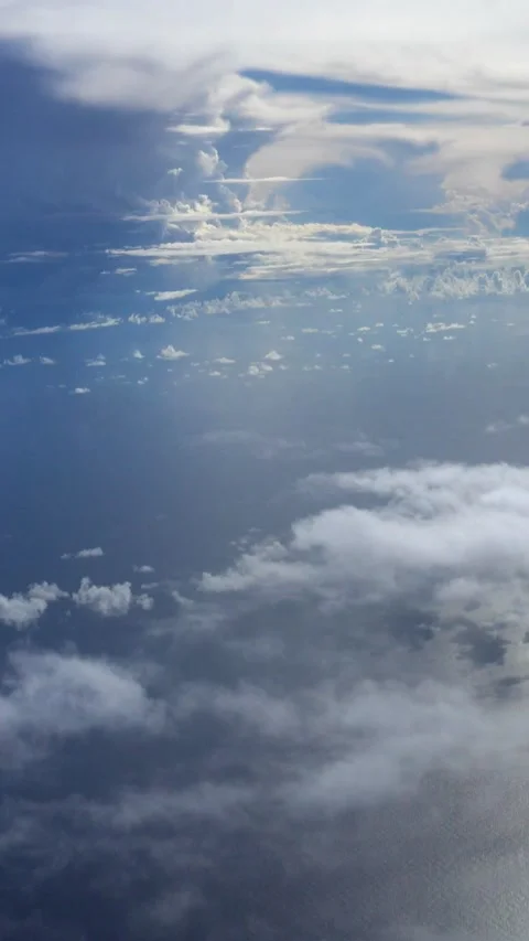 Shot of clouds with different colors and sunlight going through Video stock 228827785
