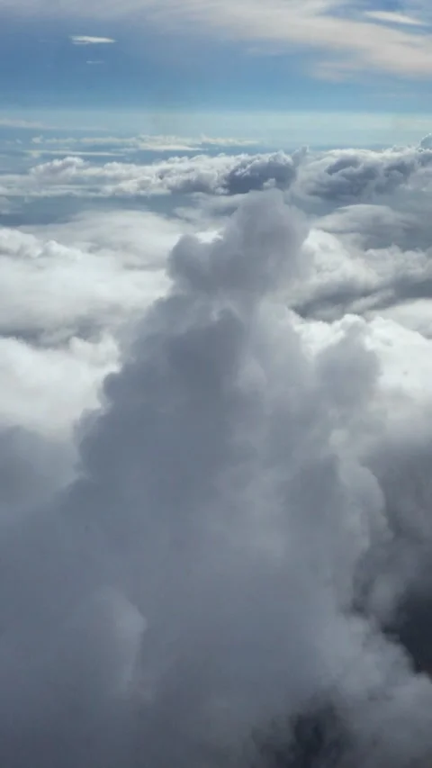 Shot of clouds with different colors and sunlight going through Stock Footage 228827786