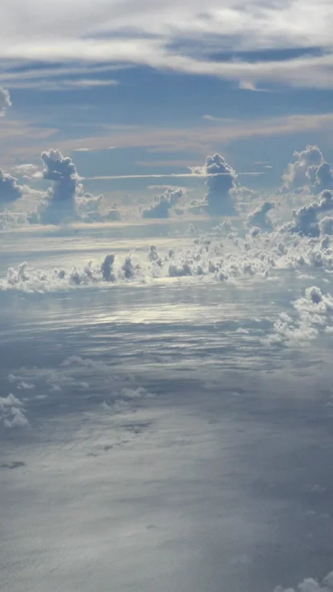 Shot of clouds with different colors and sunlight going through Stock Footage 228827787