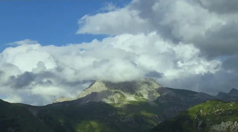 Shot of Clouds Moving over the Mountain in Lech, Austria Stock-Footage 53238460