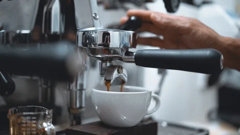 Shot of coffee from espresso machine, slow motion Stock Footage 93330184
