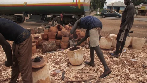 Shot of Craft artisan working on Mortar and Pestle Vídeo Stock 164539857