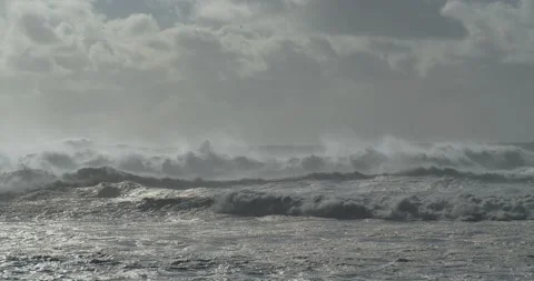 Shot of the crashing waves of the ocean full of unbridled power and chaos. Stock Footage 230889782