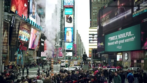 Shot of crowded Times Square at daytime 動画素材 79600349