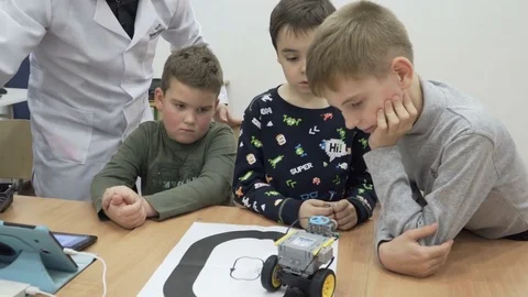 Shot of cute kids learning robotics at school lessons Stock Footage 82443676