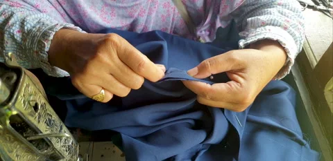 Shot of detail working tailor hands Video stock 165851349