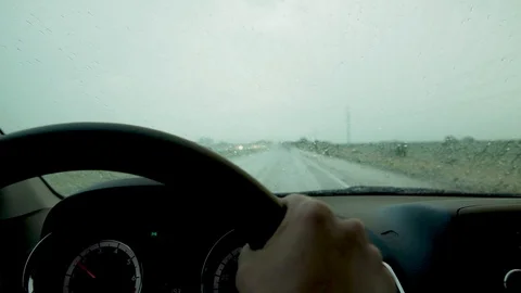 Shot of driving down highway in the rain with windshield wipers going Video stock 121550756