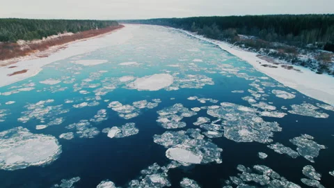 Shot on a drone. Ice floats on the river and freezes. Freezing. Winter. Stock Footage 221467589