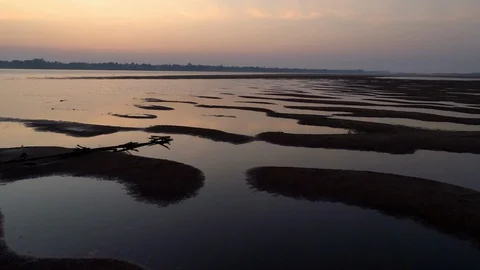 Shot on drone sunrise sunset view river and warm tone nurture landscapes. Video stock 129107657