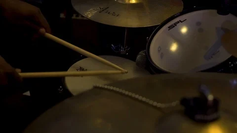 Shot of a drummer playing the snare drum and cymbal as the live event Stock Footage 104385598
