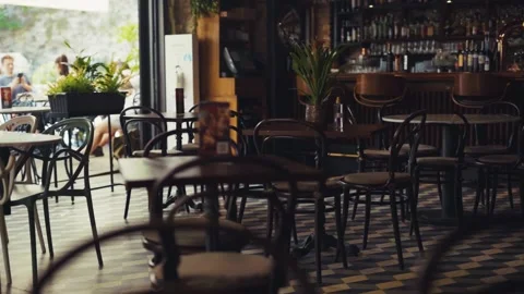 Shot of empty cafe restaurant interior with table settings chair elegant dolly Stock Footage 138702251