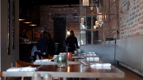 Shot of Empty Tables on A Restaurant Stockbeeldmateriaal 128927867