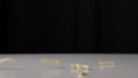 Shot of Falling snack food crispy potato salty slow motion. Fast food or junk Stock Footage 152808384