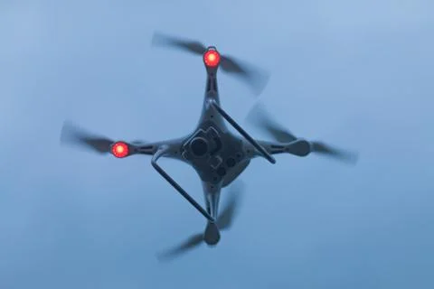 A shot of a flying dron. Stock Photos