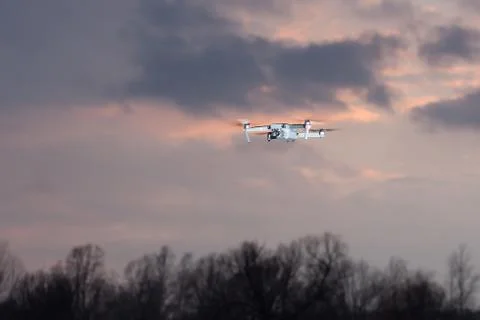 A shot of a flying dron. Stock Photos