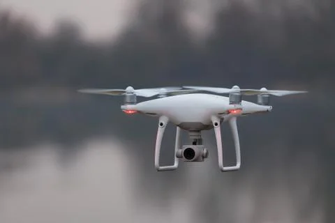 A shot of a flying dron. Stock Photos