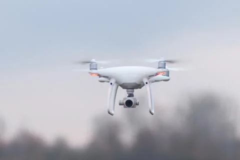 A shot of a flying dron. Stock Photos