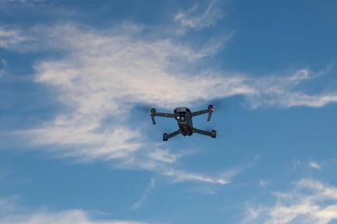 A shot of a flying dron. Stock Photos