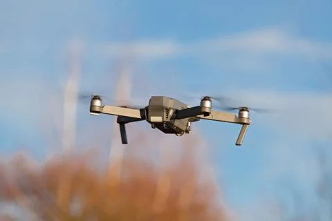A shot of a flying dron. Stock Photos