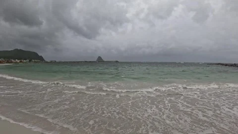 Shot of foamy ocean waves breaking on white sand at Bleik Beach Norway 動画素材 343130577