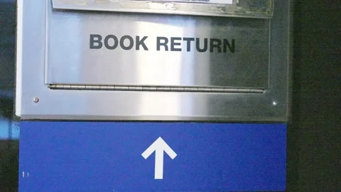 Shot of the front of a generic library book return box Stock-Footage 146504463
