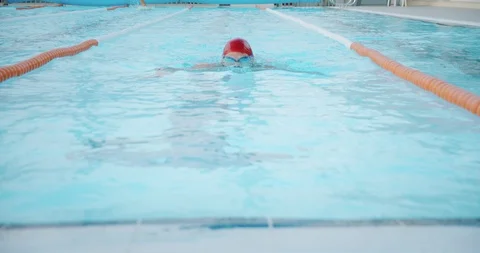 Shot from front side of professional swimmer performing breaststroke during Stock-Footage 120300809