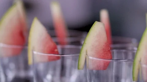 Shot Glasses with a slice of Watermelon attached Vidéo 108074136