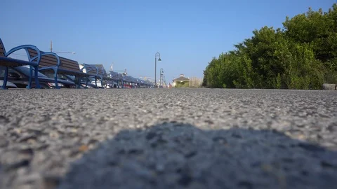 Shot from ground on concrete path Stock Footage 98909660