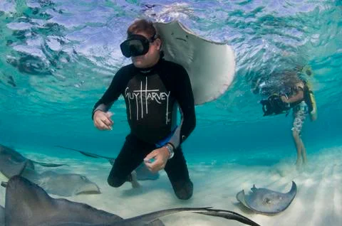 Shot of Guy Harvey with Rays and Videographer Taking Footage Stock Photos