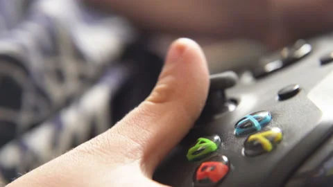 Shot of hands on a video game controller Video stock 158867079