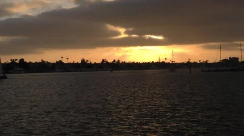 Shot of harbor and sunset on cloudy late afternoon.mp4 Video stock 67480328