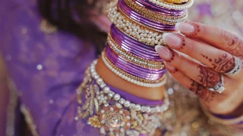 A Shot of an Indian Bride showing her Bridal Jewellery at her Indian Wedding in Stock Footage 275981353