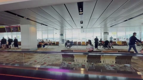 Shot of inside of a long queue departure hall area of the Hydrabad Airport Stock Footage 229363698