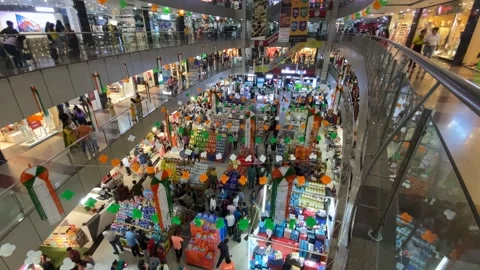 A shot of the interior of the Mall of India during the Independence day of India Stock Footage 248122685