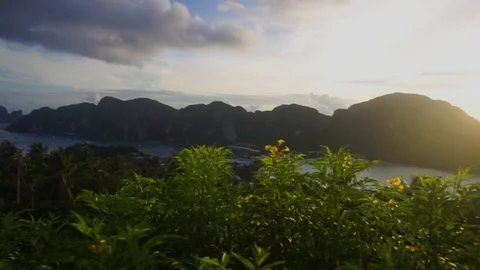Shot of koh phi phi from top of a mountain with sunset on one side in Thailand Stock Footage 88739059