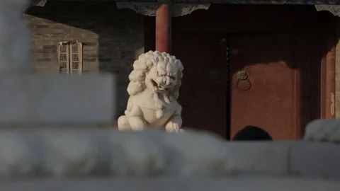 Shot of Lion Statue in front of Temple Entrance Stock Footage 75212959