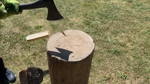 Shot of log splitting on chopping block with axe , 4k, 60fps Stock Footage 312524316