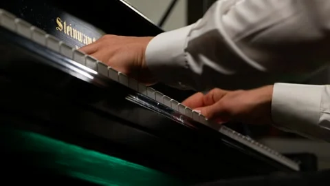 Shot Looking Up at Pianist Performing Stock Footage 257853539