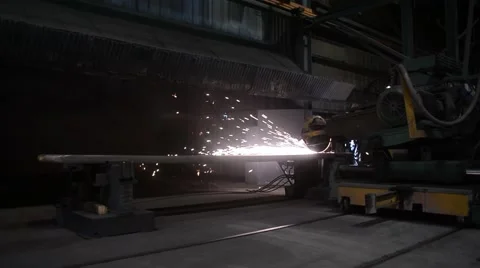 Shot of Machine Moving and Grinding on Piece of Steel Stock Footage 58252897