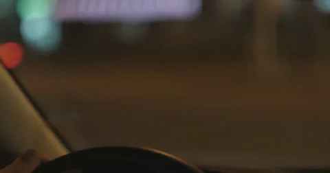 Shot of man driving at night Видео 56621034