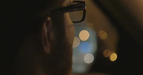 Shot of man driving at night Video stock 56622975