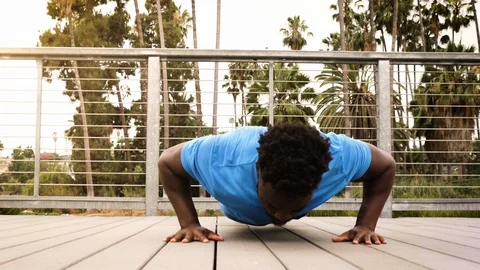 Shot of a man exercising in the park 動画素材 113783559